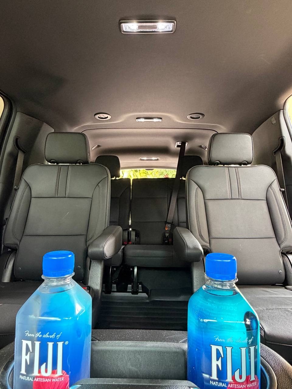 Onyx Executive Miami Suburban cabin with complimentary bottled water